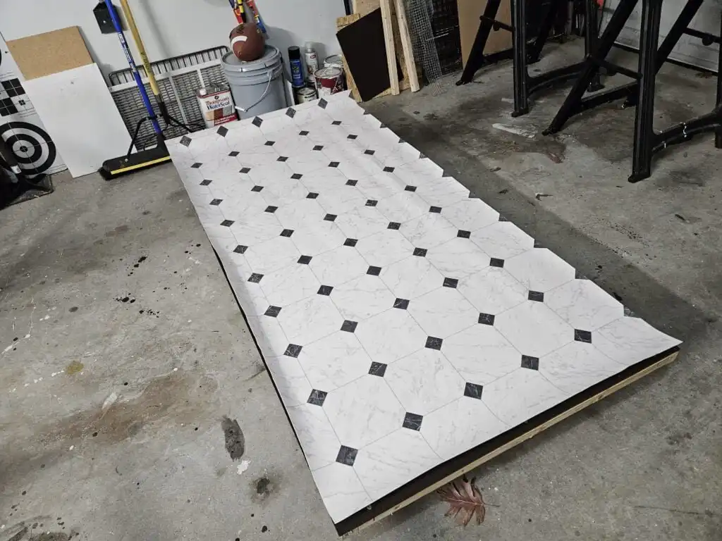 DIY Duck House attaching vinyl to the base