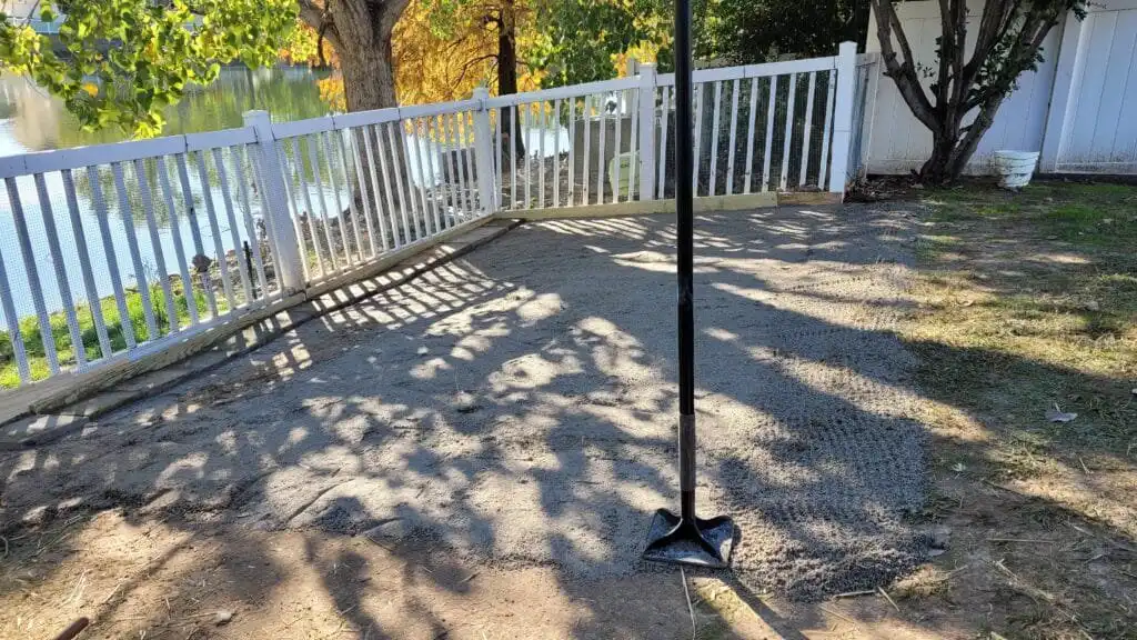 installing artificial turf for the duck run